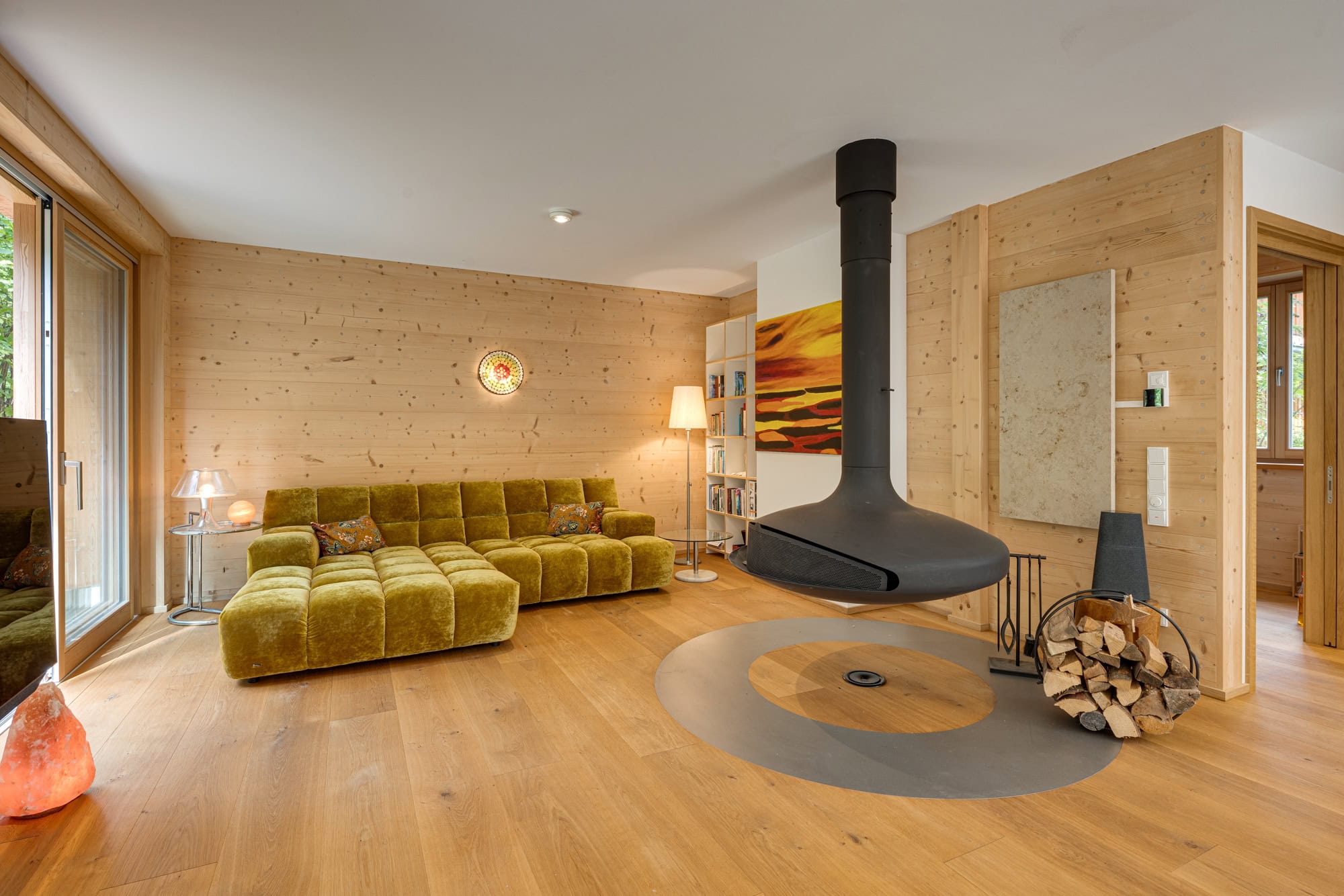 Living area with a suspended fireplace