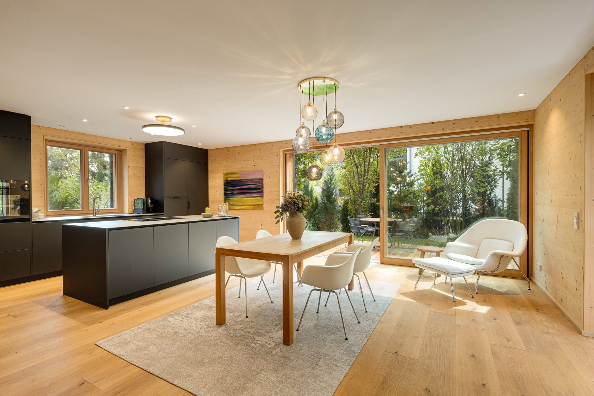 Open-concept living, dining, and kitchen area